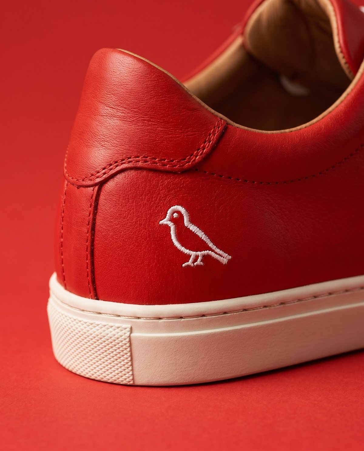 The embroidered bird on the heel tab